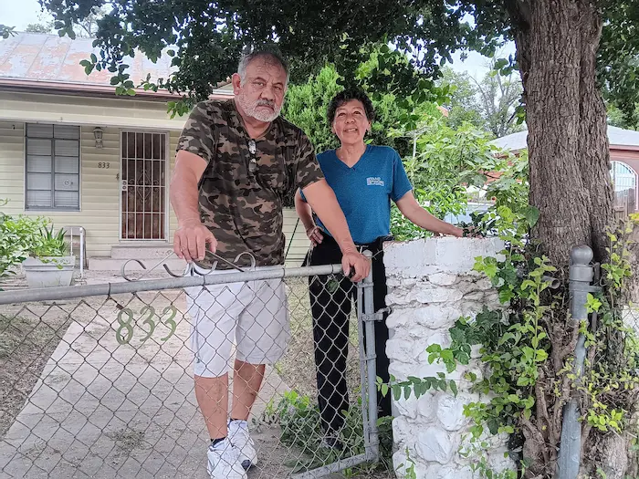 Friendly relationship between Home owner and cash buyer at entrance of property San Antonio, TX